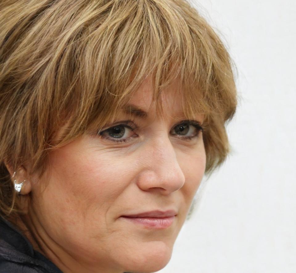 Instructor reviewing financial materials with participant